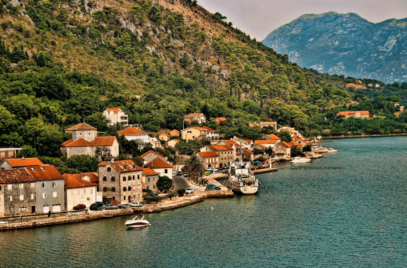 A renovated stone villa in Dobrota along the Boka Bay shore with a water view