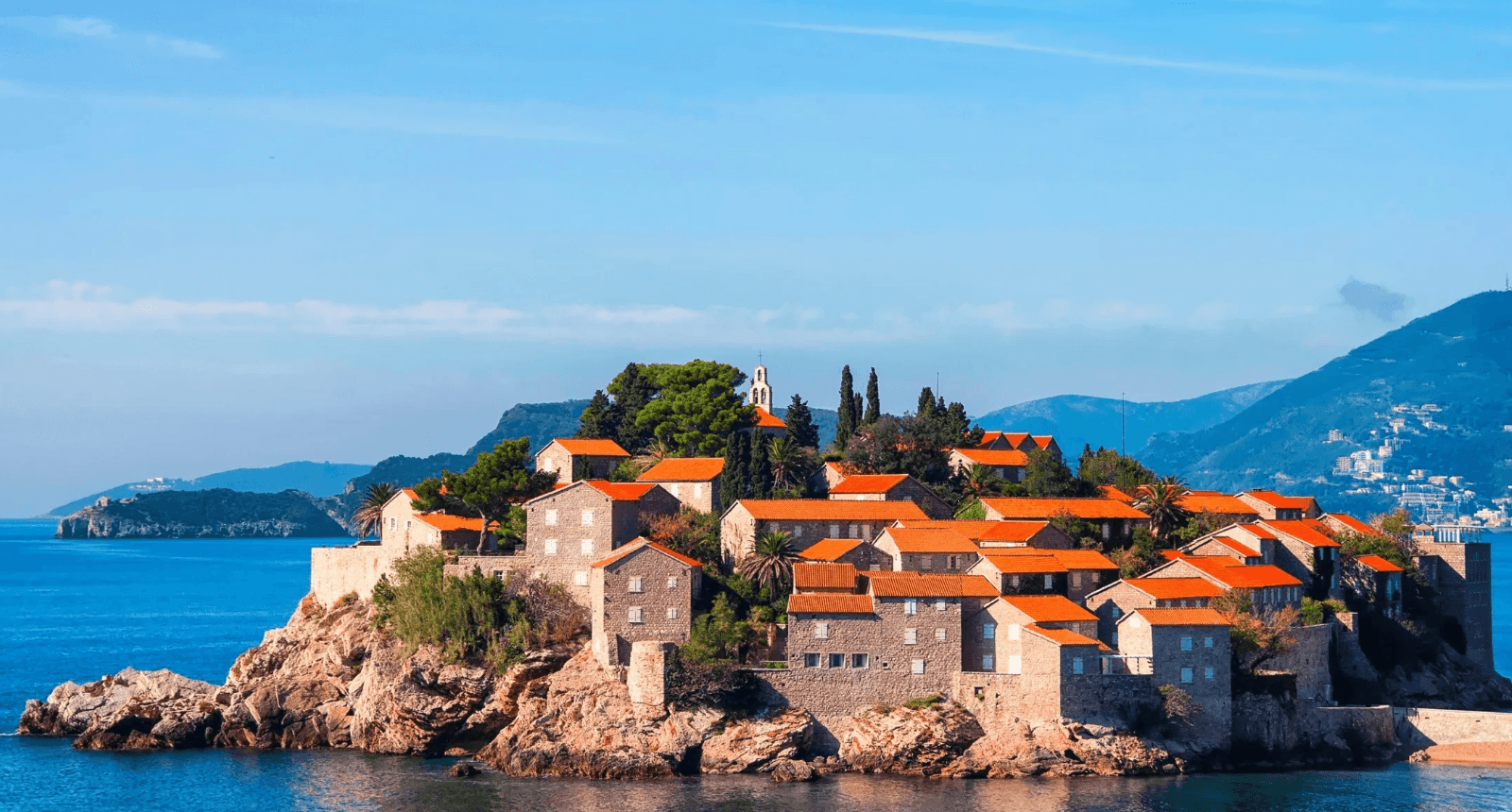 A luxury villa in Reževići on a hillside with a pool and Adriatic view