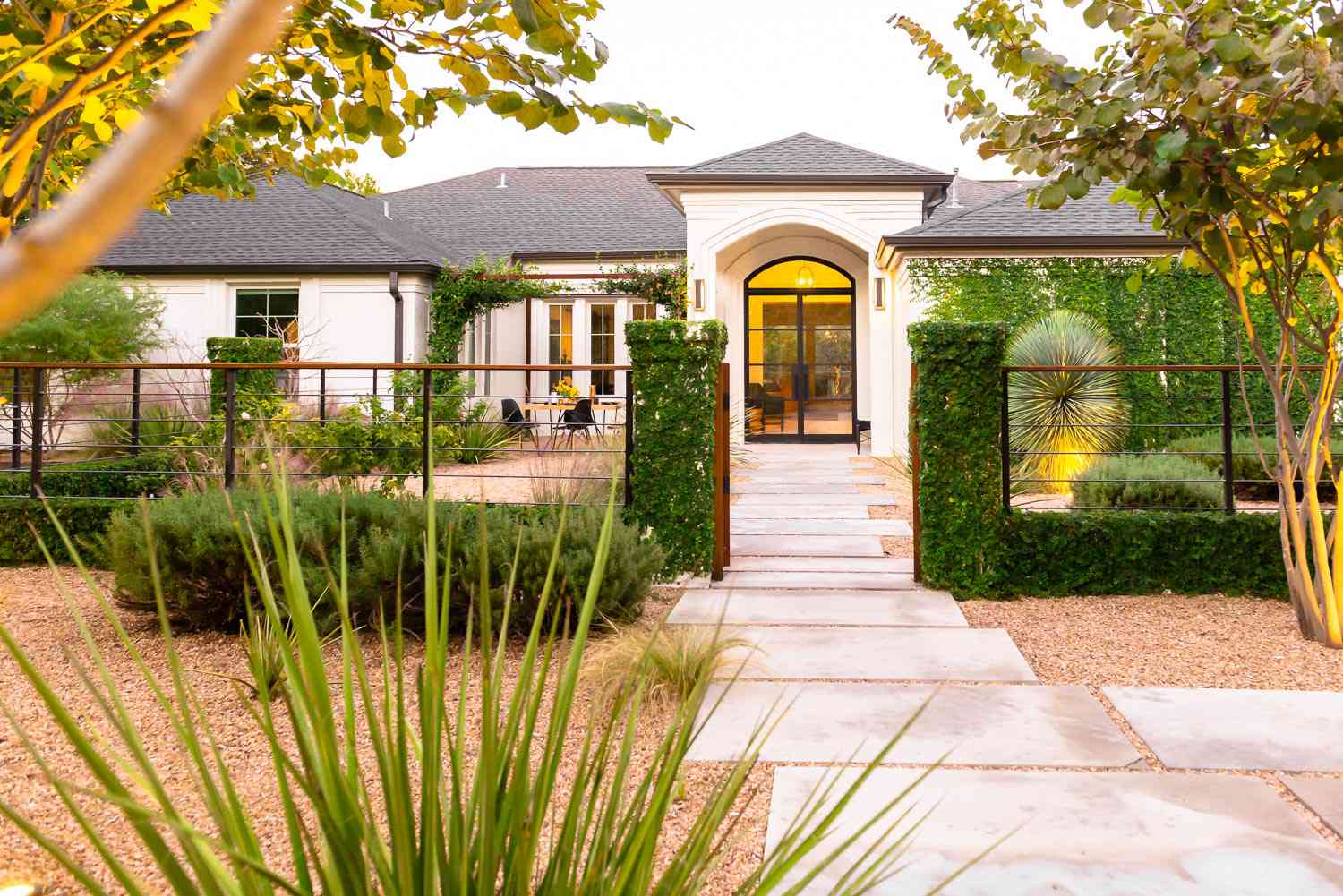 A landscaped villa yard in Montenegro with a pool, terraces and Mediterranean greenery